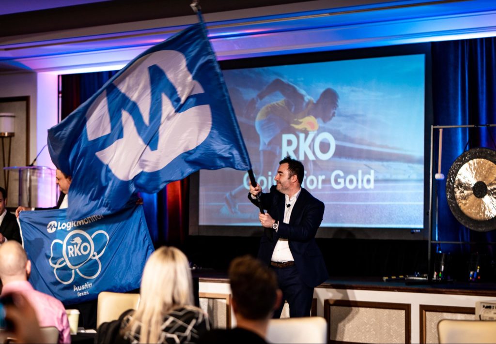 Mark Banfield, CRO at LogicMonitor, waving the LogicMonitor flag at RKO 2020